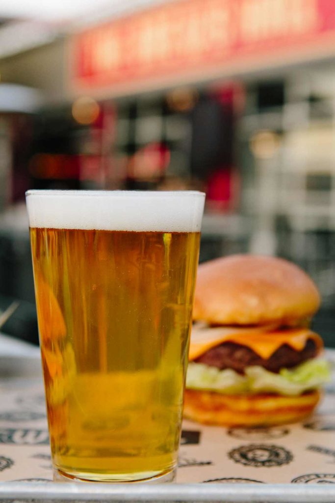 A burger and glass of beer